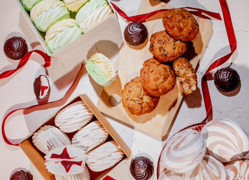 Flat Lay of Assorted Handmade Marshmallows, Chocolate Covered Sweets and Homemade Cookies