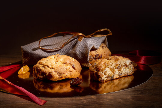 Homemade Oatmeal Cookies with Raisins and Candied Fruit on Rustic Wooden Background
