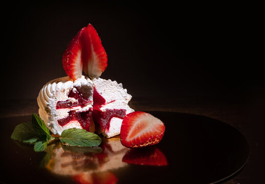 Homemade Marshmallow with Strawberry Filling and Fresh Strawberries on Dark Background