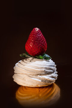 Homemade Marshmallow with Strawberry Filling and Fresh Strawberries on Dark Background