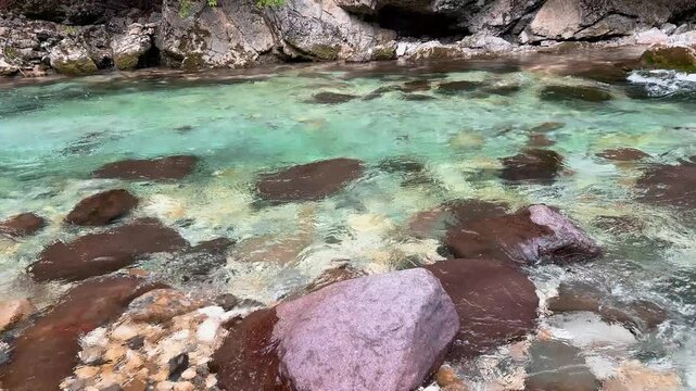 Streaming Mountain River with Crystal Cold Water. Orrido dello Slizza, Italy