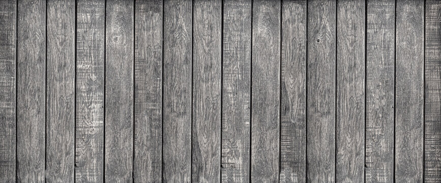 Grey weathered wood planks forming a textured wooden surface