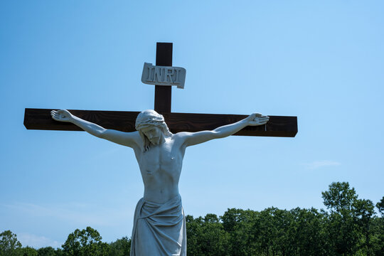 Crucifix statue of Jesus Christ on a wooden cross