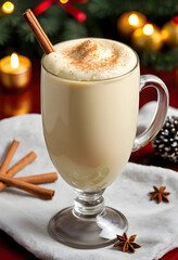 Fototapeta premium Glass of eggnog with cinnamon stick and holiday decorations