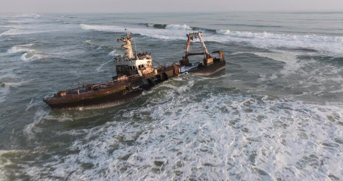 Aerial tilt up shot of the Zeila shipwreck on the Skeleton Coast in Namibia, southwest Africa.