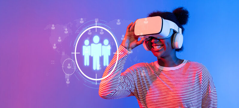 A cheerful woman wearing a virtual reality headset showcases the intersection of technology and marketing strategies to engage clients and enhance audience experiences. XDMCP