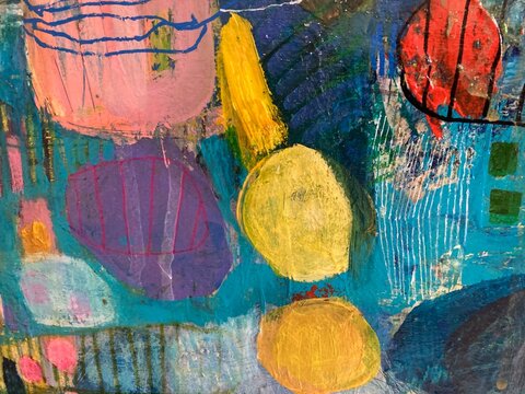 Vivid abstract painting with circular shapes in blue and yellow
