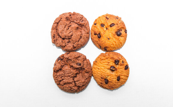 Assorted cookies and biscuits isolated on white background. Two types of cookies in a row