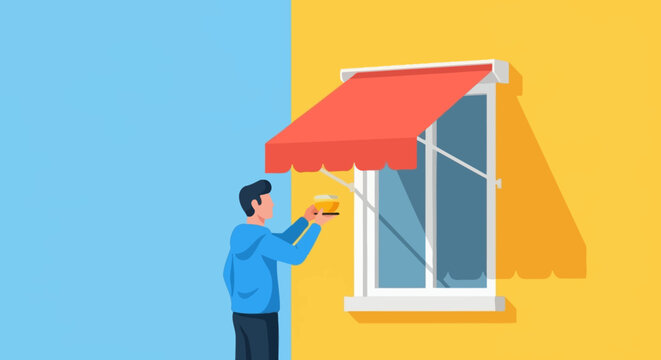 Man installing red awning on yellow house window.