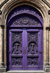 Obraz premium Ornate purple church door with religious carvings