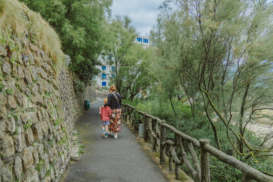 Mother and Son Walking in France
