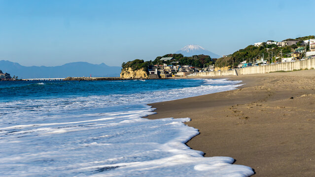 Beautiful landscape of Kamakura beach with Mount Fuji in the background. Kamakura is a city near Tokyo, located in Kanagawa Prefecture, Japan.