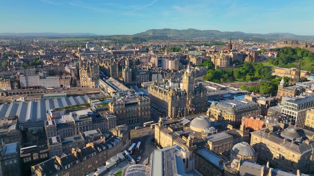 New Town aerial view on Princes Street and Balmoral House with Edinburgh Castle at the background in Edinburgh, Scotland, UK. New Town Edinburgh is a UNESCO World Heritage Site since 1995. 