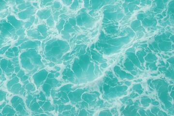 Fototapeta premium Aerial view of turquoise ocean waves with white foam patterns