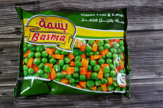Cairo, Egypt, June 16 2026: package of Basma Frozen Peas and Carrots, a widely popular product in Egypt used to prepare traditional stews, rice dishes, and quick weeknight meals