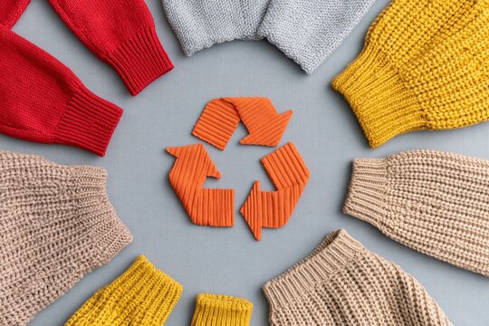 Recycle and recycling concept with sustainable fashion knitwear and textile waste