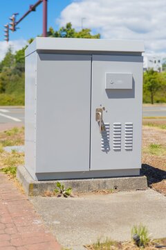 Traffic signal control box cabinet on street sidewalk