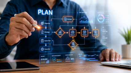 Fototapeta premium Hands using digital stylus with floating holographic flowchart and strategy interface