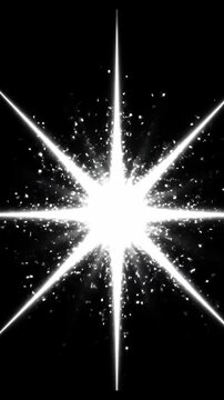 Single bright white starburst flare on black background.