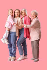 Fototapeta premium Little girl with her family on pink background