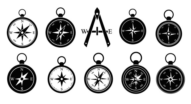 Collection of antique compasses and drawing tools.