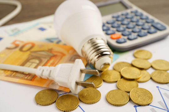 Cost of electric utilities with light bulb for payment.