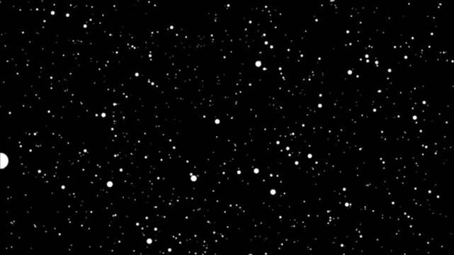 A vibrant green surface with scattered white dots meets a dark black expanse filled with white specks, creating a stark contrast and suggesting a transition or divide