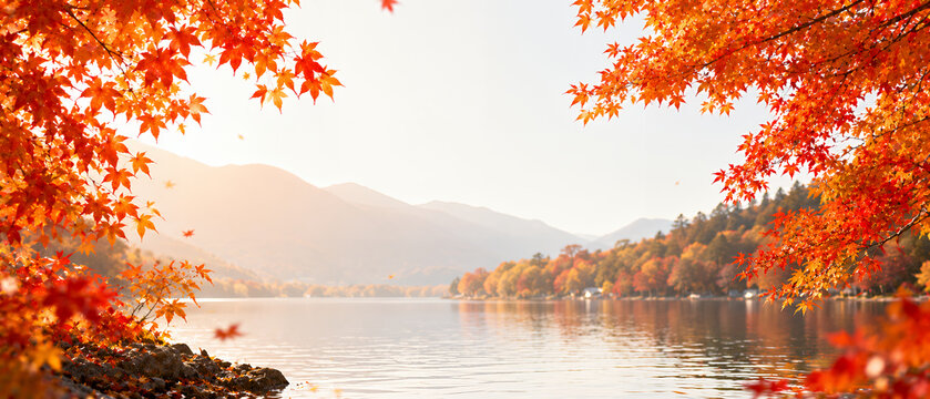 紅葉に囲まれた湖と山並み 秋の自然風景背景