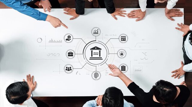 Diverse business team collaborating around a modern table with digital icons representing data analysis, finance, teamwork, and innovation in a professional environment. Entropy.
