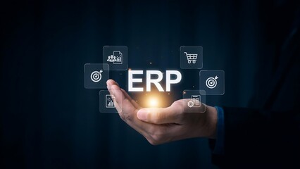 Obraz premium Businessman presenting ERP system with icons floating above his hand
