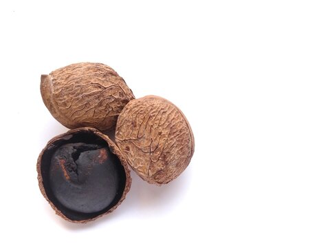 Kluwek Seeds Pangium Edule Black Nut with Whole and Cracked Shell for Indonesian Rawon Soup Isolated