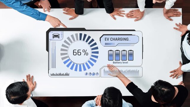 A top-down view of a business meeting focused on electric vehicle charging developments. Visual elements highlight battery levels and data-driven discussions among team members. Raster