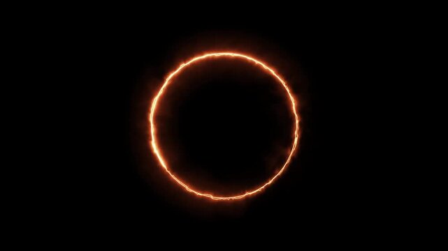 Intense glowing orange fire circle isolated on a solid black background for dynamic visual effects