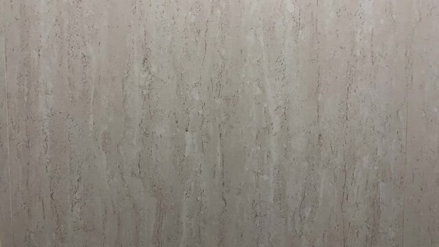 Side view of grey or gray bathroom ceramic walls. front. close up. copy space, empty, free, negative, text, design. background, bacgrounds. nobody, no people. light, bright. home, house. floor.