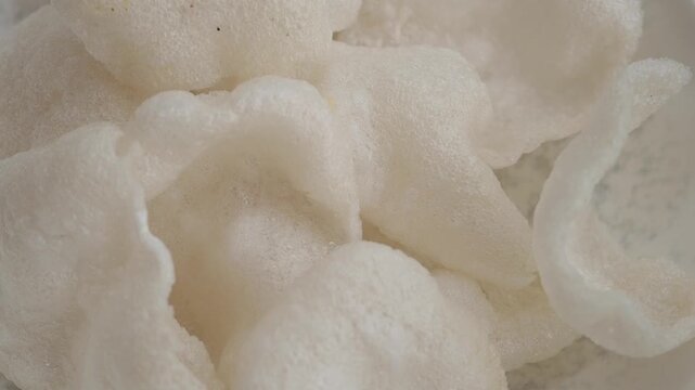 Enjoying freshly cooked rice crackers in a home setting