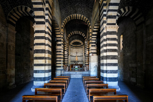 Polychrome nave of the San Pietro di Sorres Benedictine Monastery and its distinctive Pisan Romanesque architecture in Borutta, Sardinia, Italy