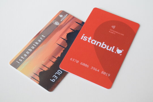 Two different generations of Istanbulkart contactless smart cards used for the public transport system placed on a white background. 