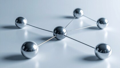 Fototapeta premium A connected network of shiny silver spheres, representing a strong link or system