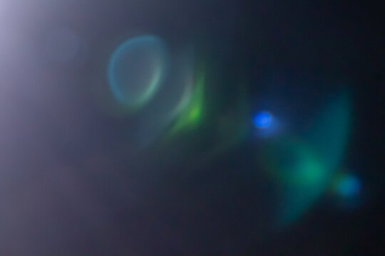 Warm lens flare overlay with light leaks and bokeh