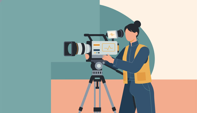 Professional female videographer in a yellow vest operating a large cinema camera mounted on a sturdy tripod.
