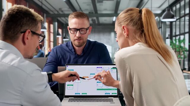 Project Manager Leads Diverse Team Optimizing Automated Workflow