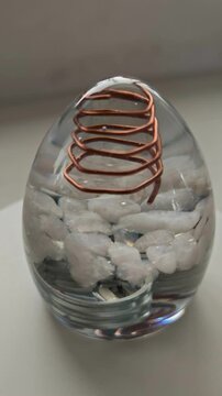 Clear Orgone Energy Egg Sculpture with White Quartz Crystals | Rotating Epoxy Resin Spiritual Meditation Healing Art Object
