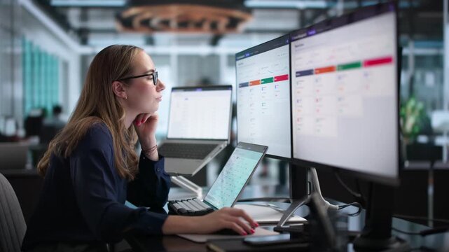 IT Manager Reviews User Access Requests On Computer