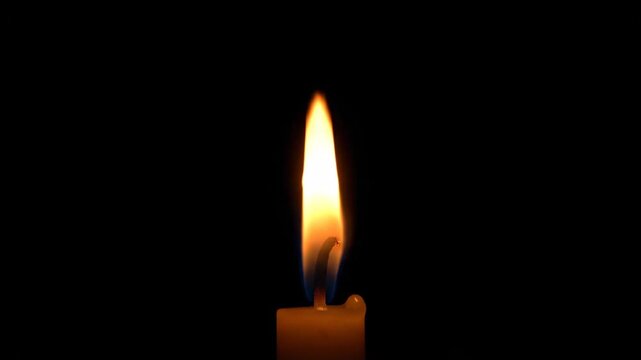 Burning Fire Flame on Black Background, Warm Golden Light, Energy and Passion