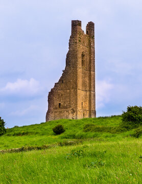 Tower castle ruins of the Saint Mary's Abbey Steeple in Trim at sunset, Ireland