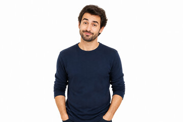 Obraz premium A young man with dark, curly hair wearing a navy blue long-sleeved shirt is posing against a white background.