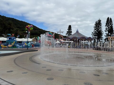 Amusement Park With Carousel and Fountain