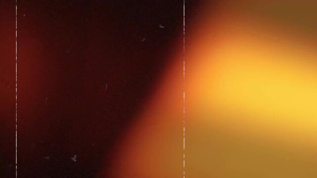 Vintage film grain with amber light leaks and scratches overlay. Orange light leaks and heavy film grain flicker on black background with scratches. Perfect for creating a nostalgic or retro aesthetic
