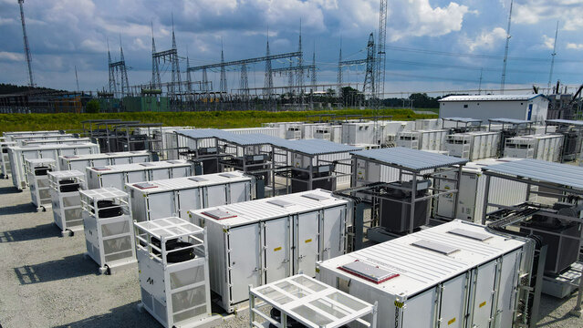 Large battery energy storage systems integrating with an electrical substation, providing grid stability and managing energy from renewable sources for sustainable power