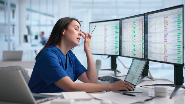 Female Nurse Rubbing Tired Eyes Painfully.